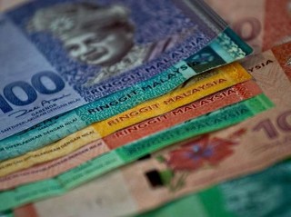 Девальвация юаня разжигает валютный кризис в Азии
